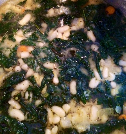 White beans with kale braised in chicken stock and vermouth.