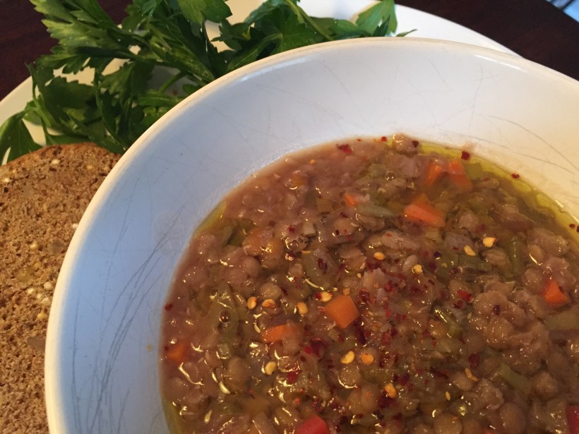 Finish the dish with a drizzle of good olive oil.  A spicy red pepper paste such as harissa would be very good as well.  Also, some fresh chopped herbs would work nicely too.  However, I think this simple dish is best when the vegetables and red wine do the talking...