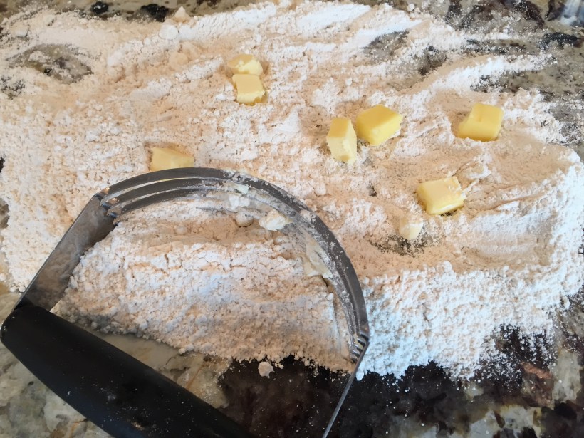 The tart shell, per the recipe, can be made in a food processor.  However, I prefer to do it by hand on the counter top.  