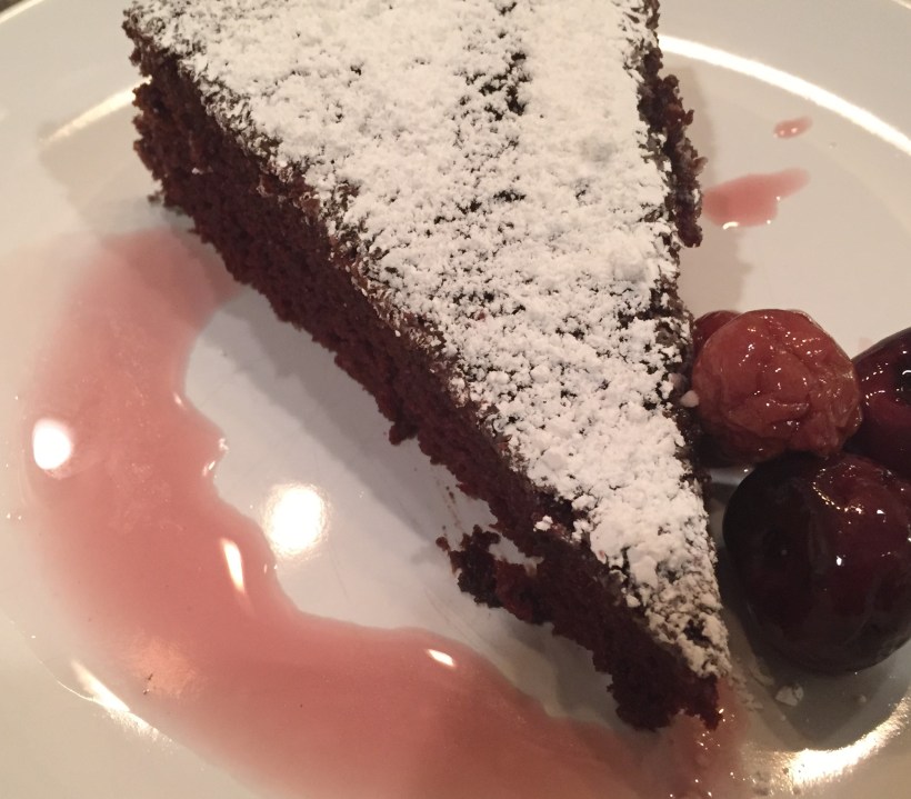 Chocolate cake drizzled with brandied cherries. If you don't have brandied cherries, any liqueur would work well too.