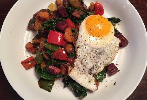 Lighten up a traditional corned beef hash by added greens, different types of potatoes, herbs, and other vegetables.