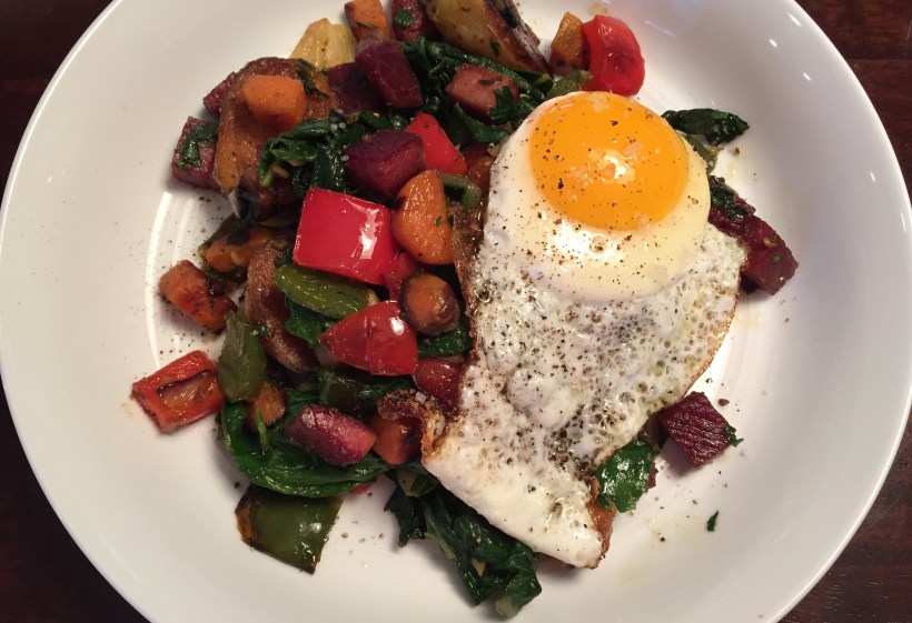 Lighten up a traditional corned beef hash by added greens, different types of potatoes, herbs, and other vegetables.