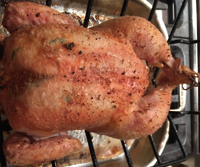 Roasted chicken rubbed with roasted garlic and sage