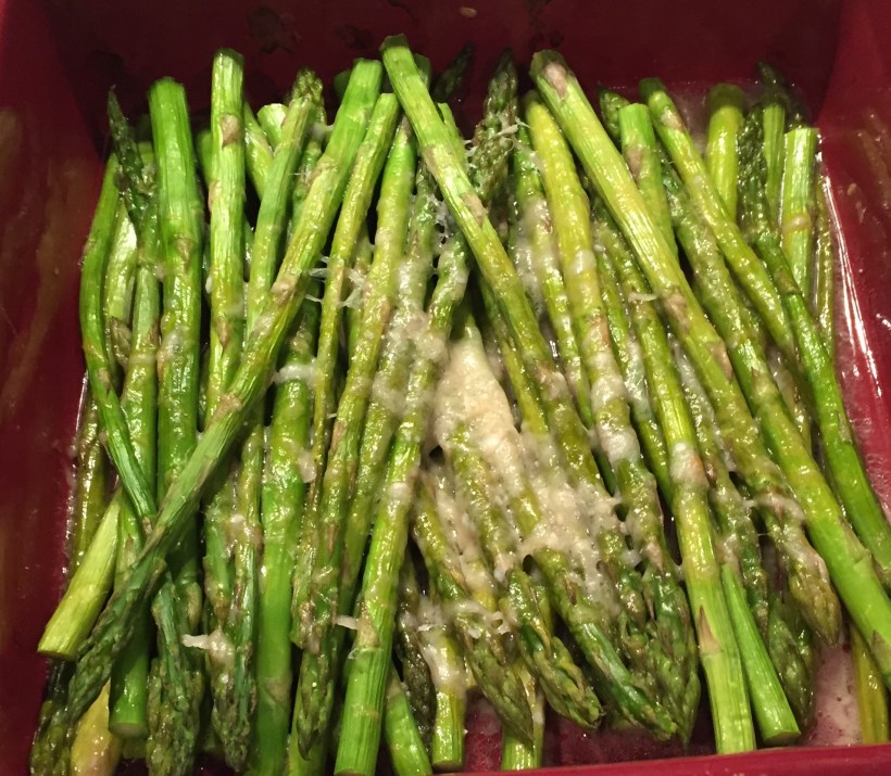 Roast the asparagus.  I layered the asparagus spears with grated Parmesan cheese.  