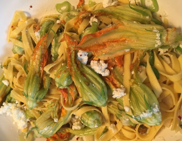 Gently toss the squash blossoms into the pasta as they will tear and break very easily.